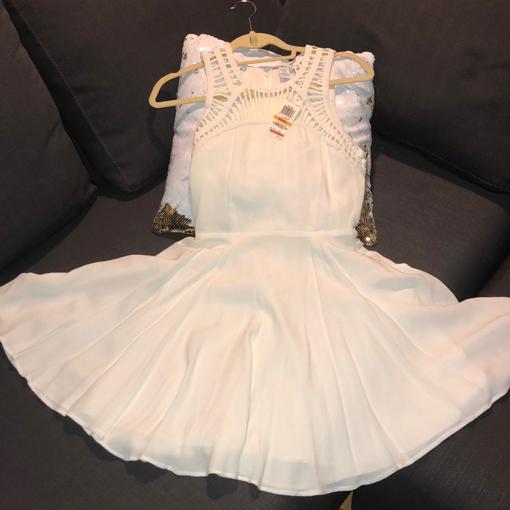 White dress with cut out details